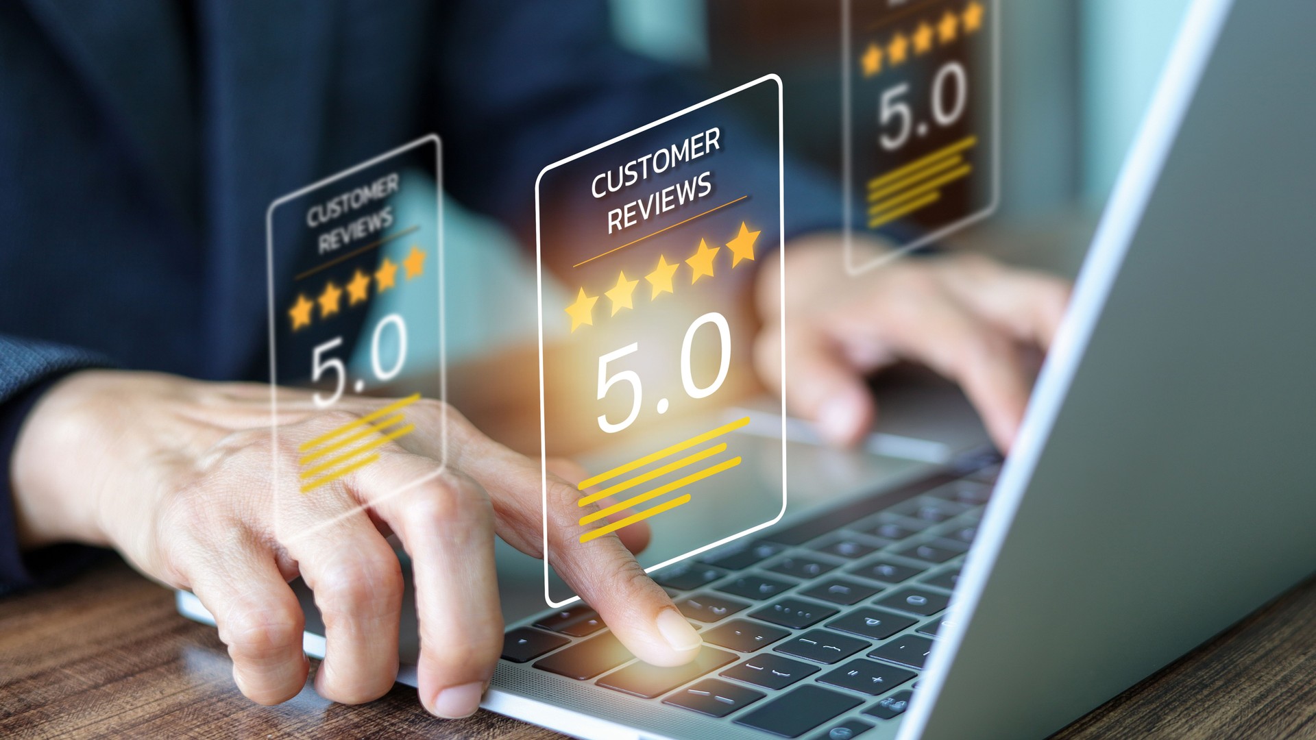 Businessmen's hands interact with a laptop, with holographic displays of CUSTOMER REVIEWS featuring five-star ratings and a perfect score of 5.0 on the screen. Positive feedback, online survey.